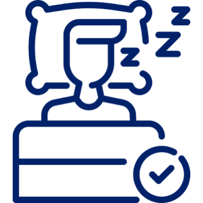 Person sleeping with pillow and check mark.